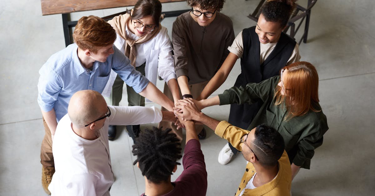 Top view of diverse group of people collaborating in office setting.