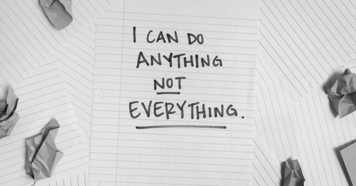 A motivational message on paper surrounded by crumpled sheets, symbolizing focus amidst chaos.